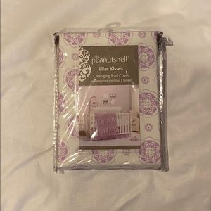 The Peanutshell Lilac Kisses changing pad cover.